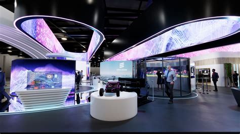 Futuristic matte black exhibition stand with dynamic DMX RGB neon light channels at GITEX Dubai